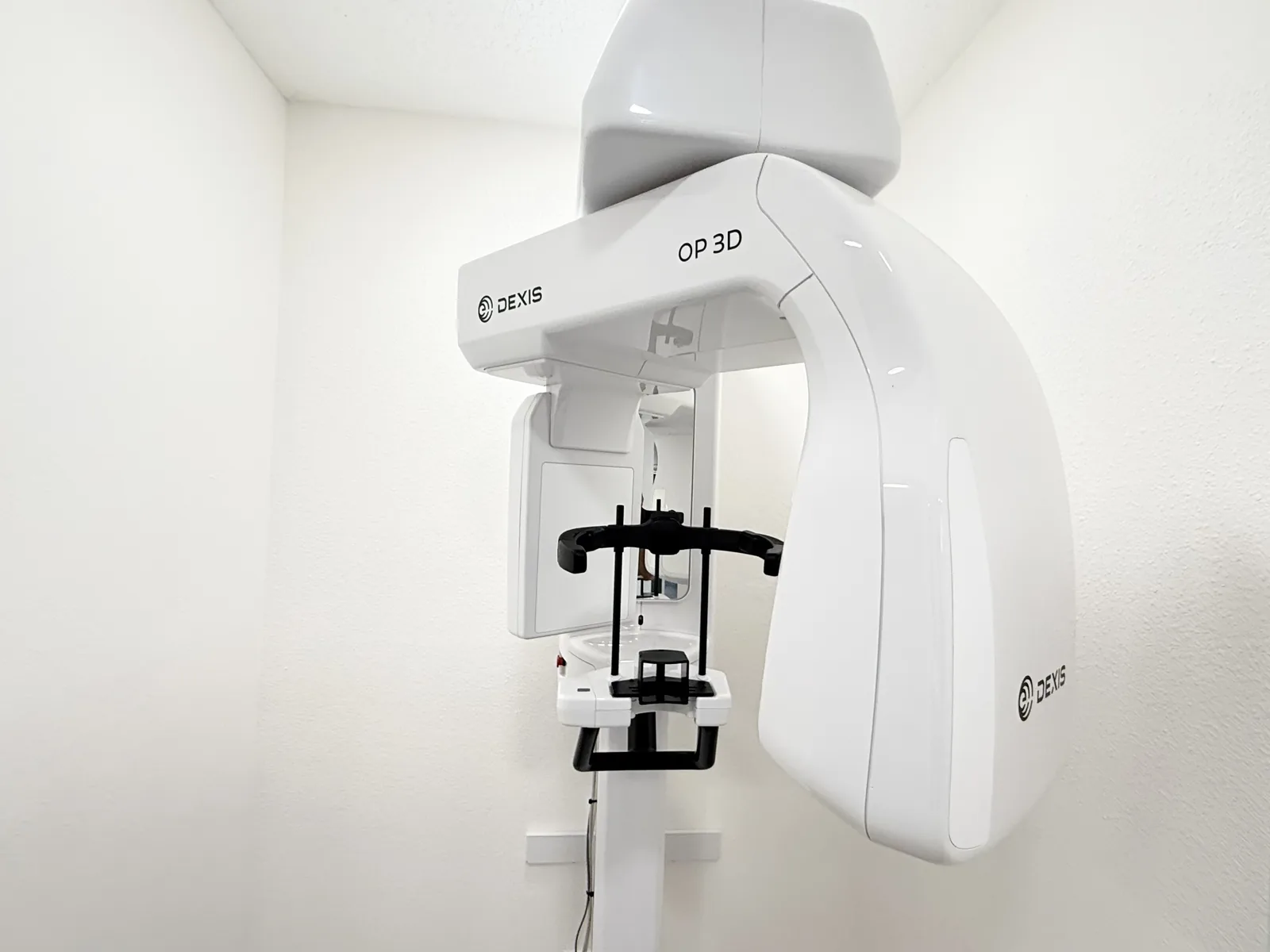 DEXIS OP 3D cone-beam CT scanner standing in the imaging room of our Beaverton dental office